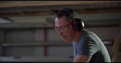 Close Up Of Worker With Protective Glasses And Ear Muffs Stock Footage 74601408