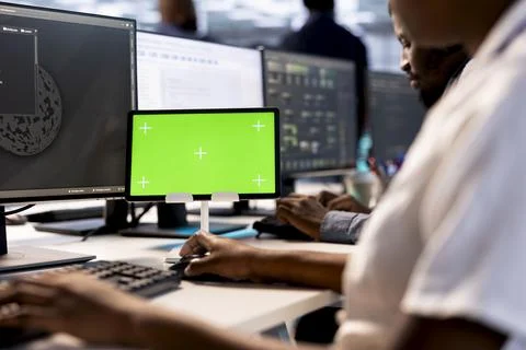 Close up of worker safeguarding data center using mockup tablet Stock Photos