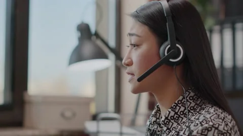 Close up of worker talking on phone call at customer service Stock Footage 166010961