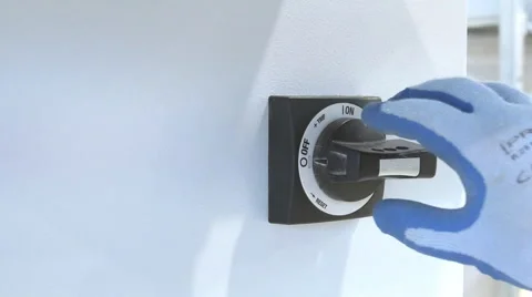 Close-up worker turn on CNC on factory Stock Footage 60802923