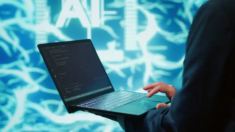 Close up of worker using AI deep learning and laptop to look at data Stock Footage 278623368