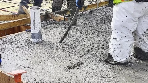 Close-Up of Worker Using Concrete Vibrator at Job Site Stock Footage 302563682