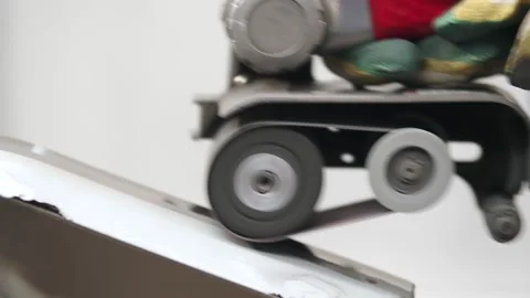 Close-up of a worker wearing gloves grinding the surface of a part with a Stock Footage 227295141