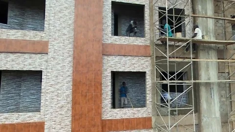 Close up of workers on a building in works Stock Footage 80359289