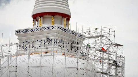 Close up of the workers group are restored. Repair of the old pagoda. Stock Footage 77200784