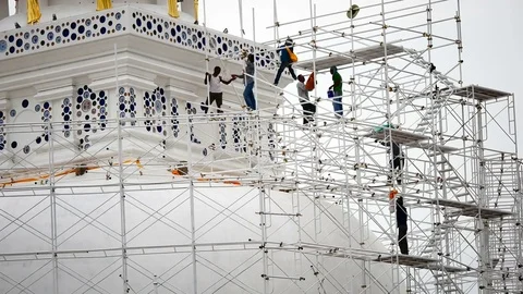 Close up of the workers group are restored. Repair of the old pagoda. Video stock 77200818