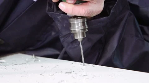 Close-up of the workers hands drilling with the electric dril 库存影片 62470528