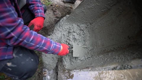 Close up of working with fresh concrete Stock Footage 158974433