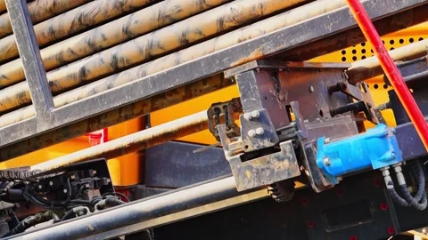 Close-up of working HDD horizontal directional drilling rig. The shuttle ro.. Stock Footage 318610907