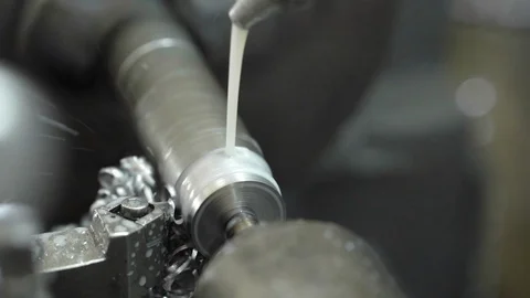 Close up of working lathe machine and lubrication with water  in the industri Stock Footage 107175022