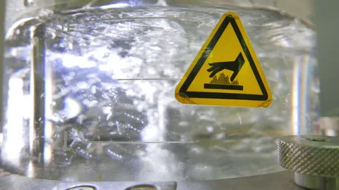 Close-up of working liquid bioreactor, glass cylinder with mixing liquid inside Stock Footage 154513873