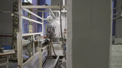 Close up at the working machine at the fabric and garment factory Stock Footage 150701684