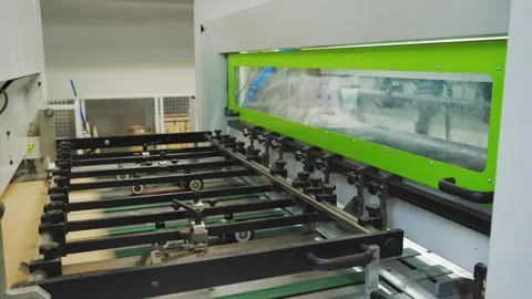 Close-up of a working machine for the production of corrugated cardboard package Video stock 280120594