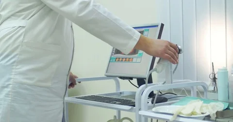 Close-up of working medic hands with pc and devices. Male doctor is working on a Stock Footage 83038223