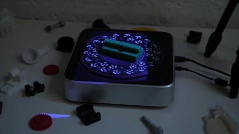 Close-up of a working modern 3D scanner reading data from a plastic object. Stock Footage 311797012