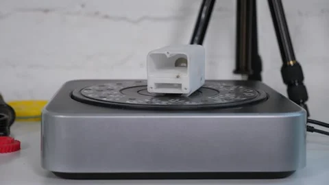 Close-up of a working modern 3D scanner reading data from a plastic object. Stock Footage 312439229