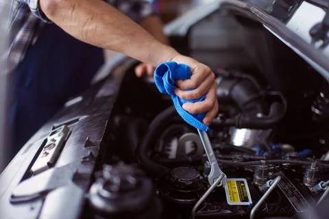 Close up of the working process in the car repair workshop. Stock Photos