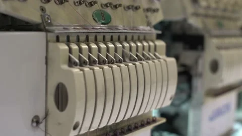 Close up at the working sewing machine at textile production Stock Footage 150657598