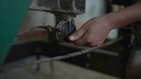 Close-Up,working in The Shop With The Wrench Trying to Break a Long Clip From Stock Footage 76641789