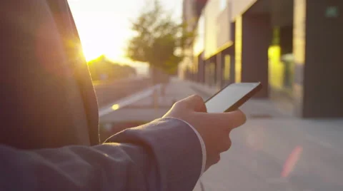 CLOSE UP: Working on smartphone outdoors Stock Footage 45135855