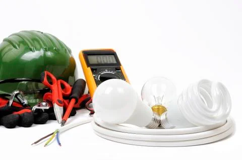 Close-up of working tools and components of the electrical system on white ba Foto stock