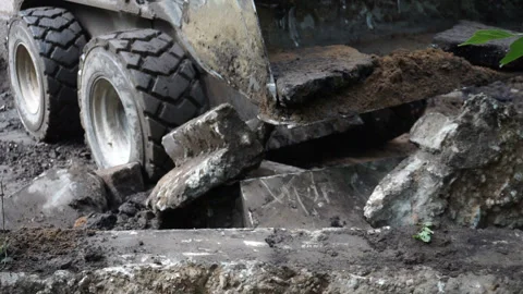 Close-up of a working tractor with a bucket. Stock Footage 252986163