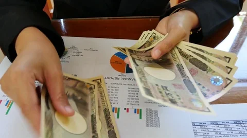 Close - up working woman  hand count money with  financial report in bussin.. 動画素材 76246469