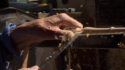 Close up of working on wood lathe using a chisel Stock Footage 126725762