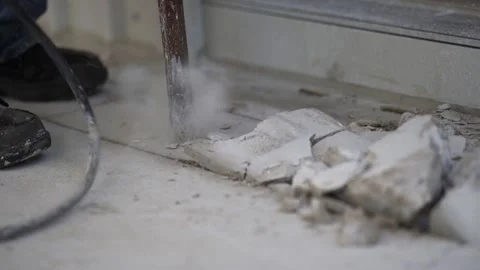 Close up of a workman using a jackhammer to remove concrete Stock Footage 171965899