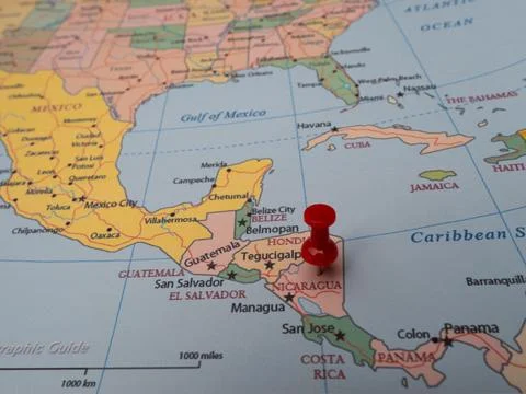 Close-up of a world map with a pin pointing to the location of Nicaragua Fotos Stock