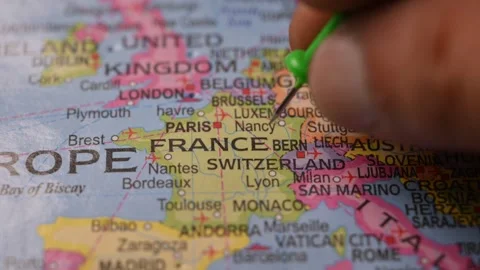 Close-Up World Map Shot Featuring Green Pin Highlighting France Pointed Stock Footage 333579877