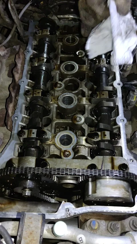 Close-up of a worn automotive engine valve train assembly Stock Footage 347085541