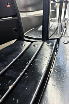 Close Up of Worn Black Bench Surface with Scratches and Abstract Texture Stock Photos