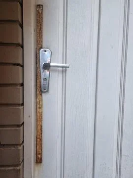 Close-up of a worn door lock Foto stock