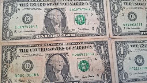 Close-up of worn US dollar bills showing aging and currency details. Financial Stock Photos
