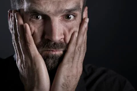 Close up of worried man facepalming. Foto stock