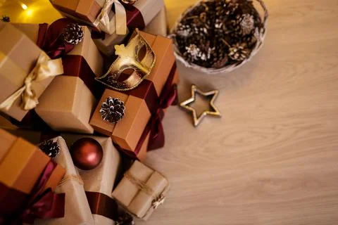 Close up of wrapped gift boxes and copy space on wooden floor Stock Photos
