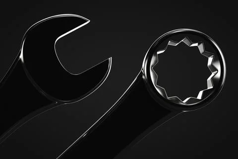 Close-up wrenches. Dark background. Tools theme. Stock Photos