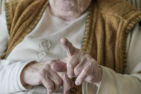 Close up wrinkled hands Stock Photos