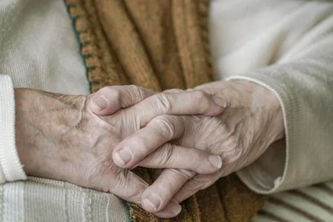 Close up wrinkled hands Stock Photos