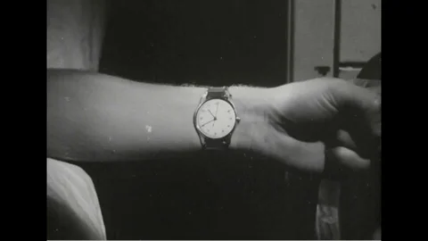 Close-up of wristwatch on wrist - 1958 Stock Footage 101407327