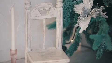 Close up xmas tree and candle with chair in white color Stock Footage 122736279