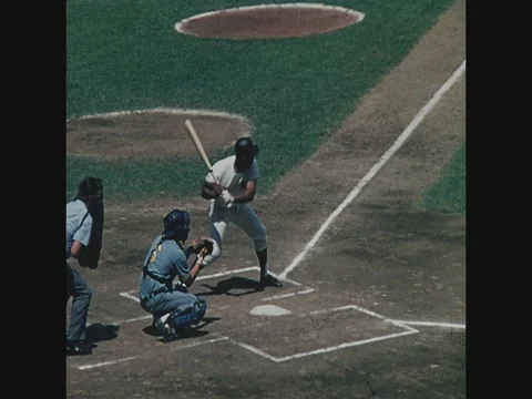 Close up Yankee batter hits ball, runs to first and is out at Yankee Stadium, Video stock 82550232