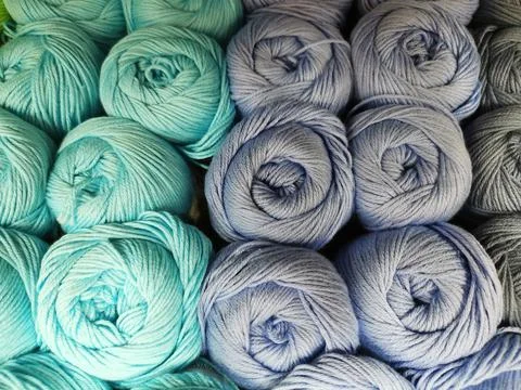 Close-up of yarn for knitting. Balls of thread, material for creating things. Stock Photos