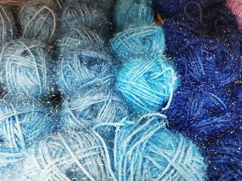 Close-up of yarn for knitting. Balls of thread, material for creating things. Stock Photos