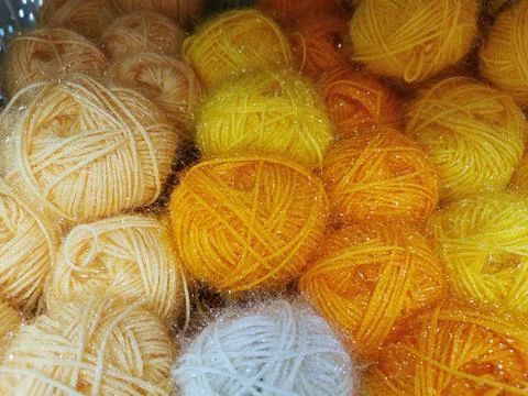 Close-up of yarn for knitting. Balls of thread, material for creating things. Stock Photos