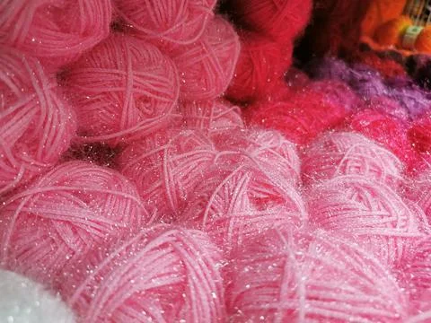 Close-up of yarn for knitting. Balls of thread, material for creating things. Stock Photos