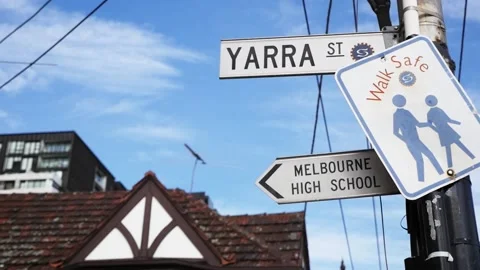 Close up of Yarra St, Melbourne high school and walk safe sign in Melbourne Stock Footage 155483584