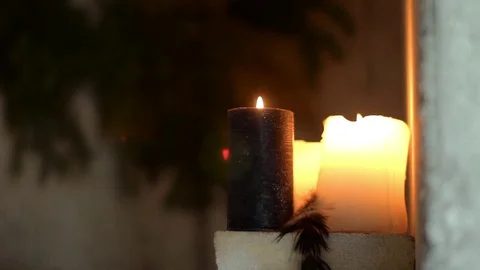 Close up of yellow Candles with dark background Video stock 73107814