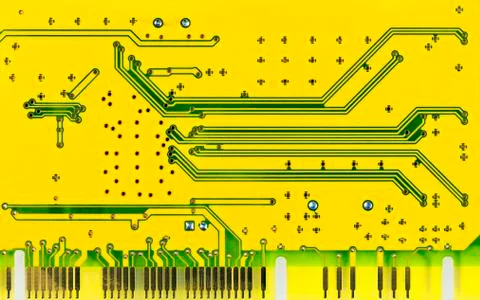 Close up of a yellow computer microcircuit Stock Photos